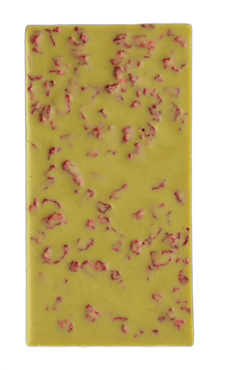A pale green pistachio chocolate bar with raspberry flakes